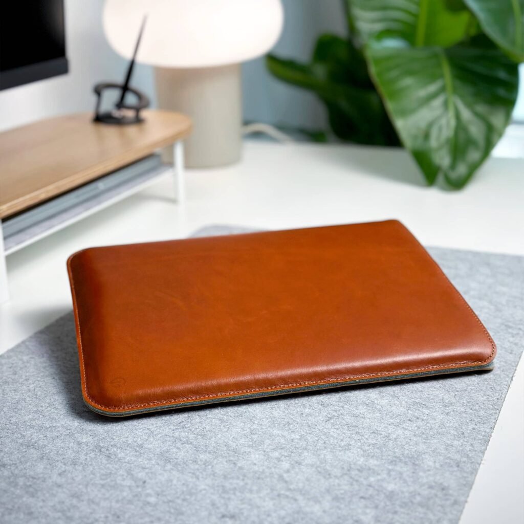 casemade leather laptop sleeve on desk tan brown